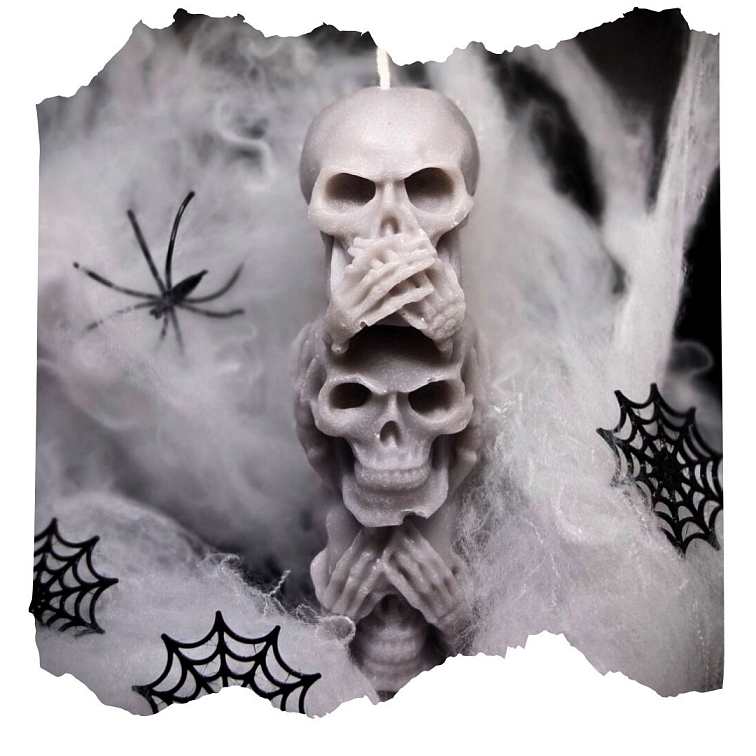 Tři moudré lebky svíčka