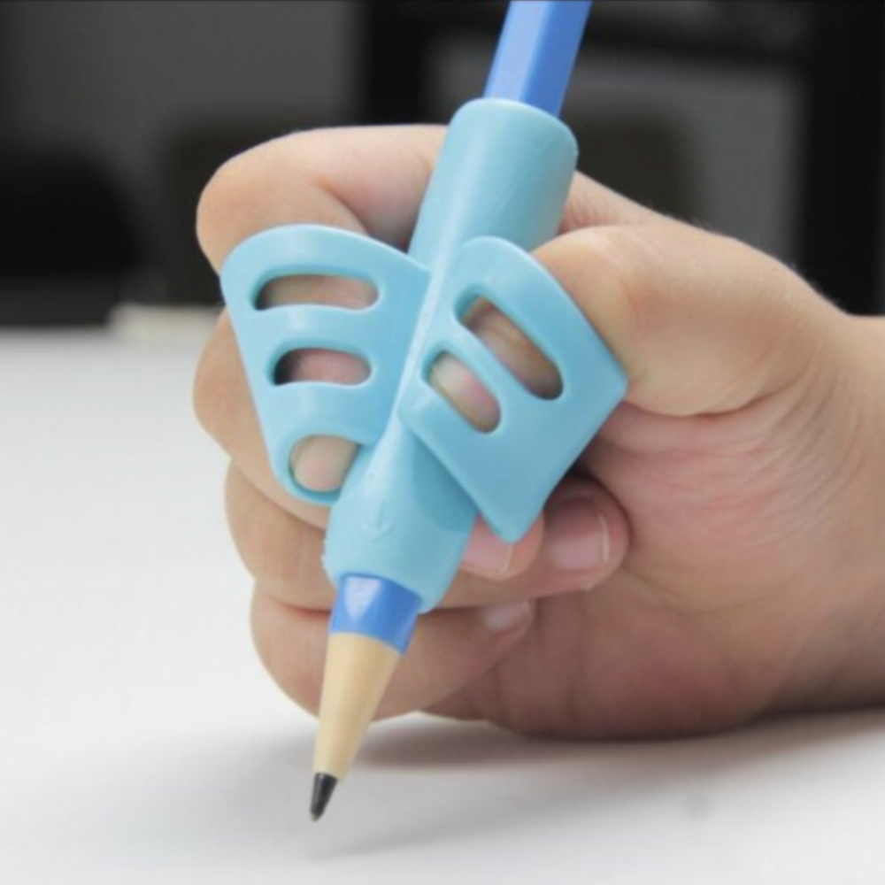 Pomůcka pro správné držení tužky