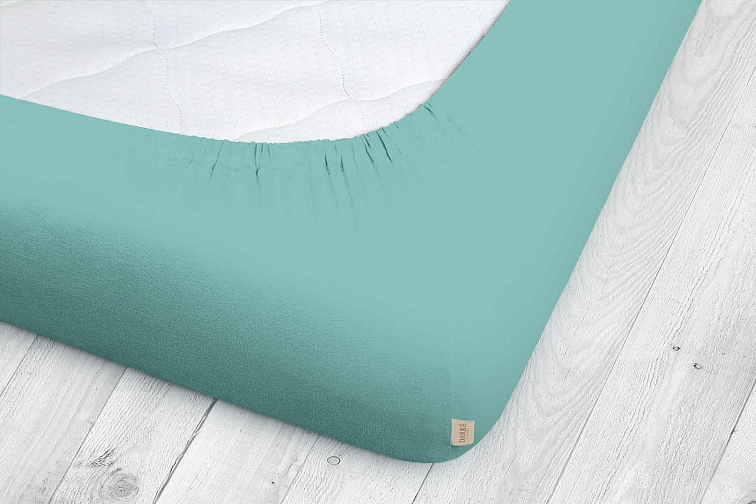 Jersey prostěradlo světle smaragdové na výšku matrace do 40 cm