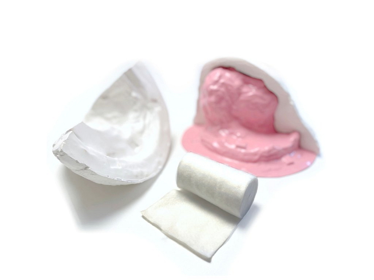 Polstrovací obvaz pro vytváření sádrových forem